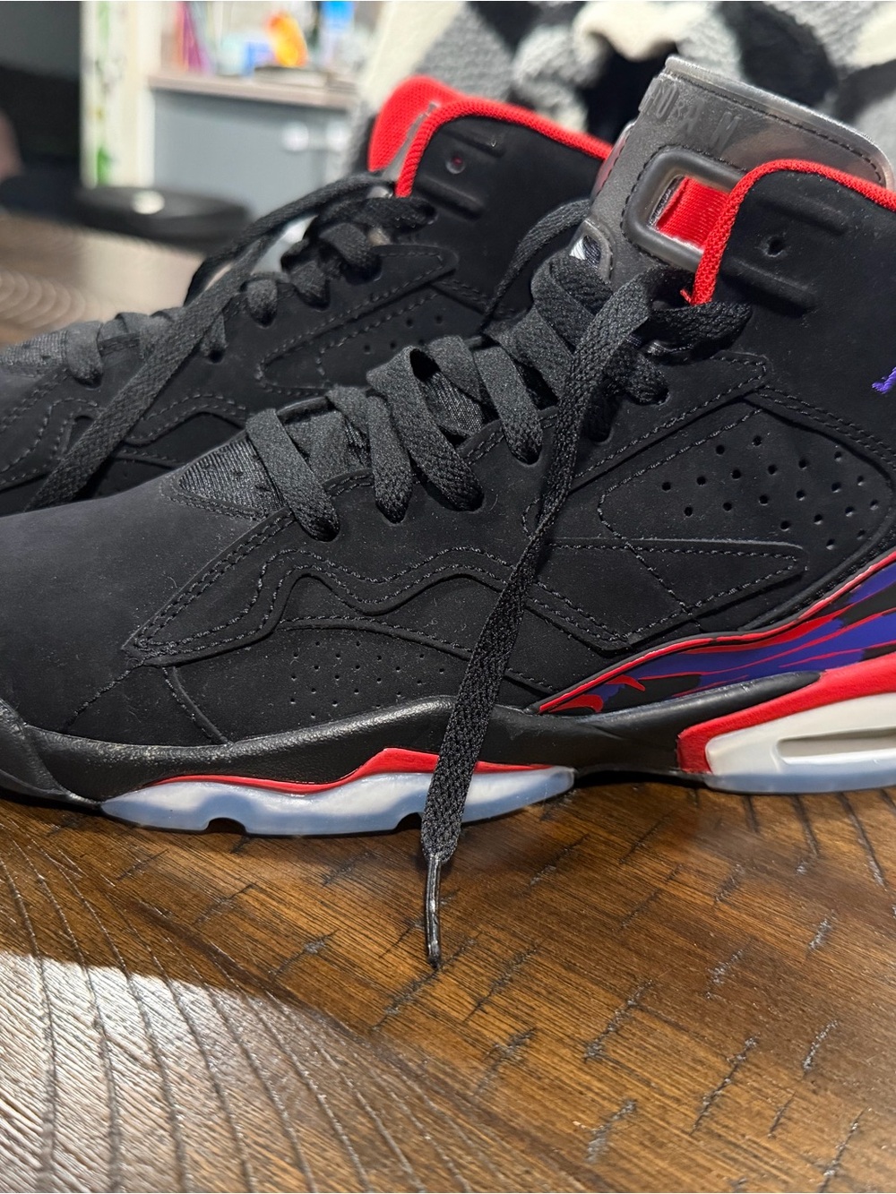 Jordan Men’s High-Top Sneakers in Black with Red and Purple Accents